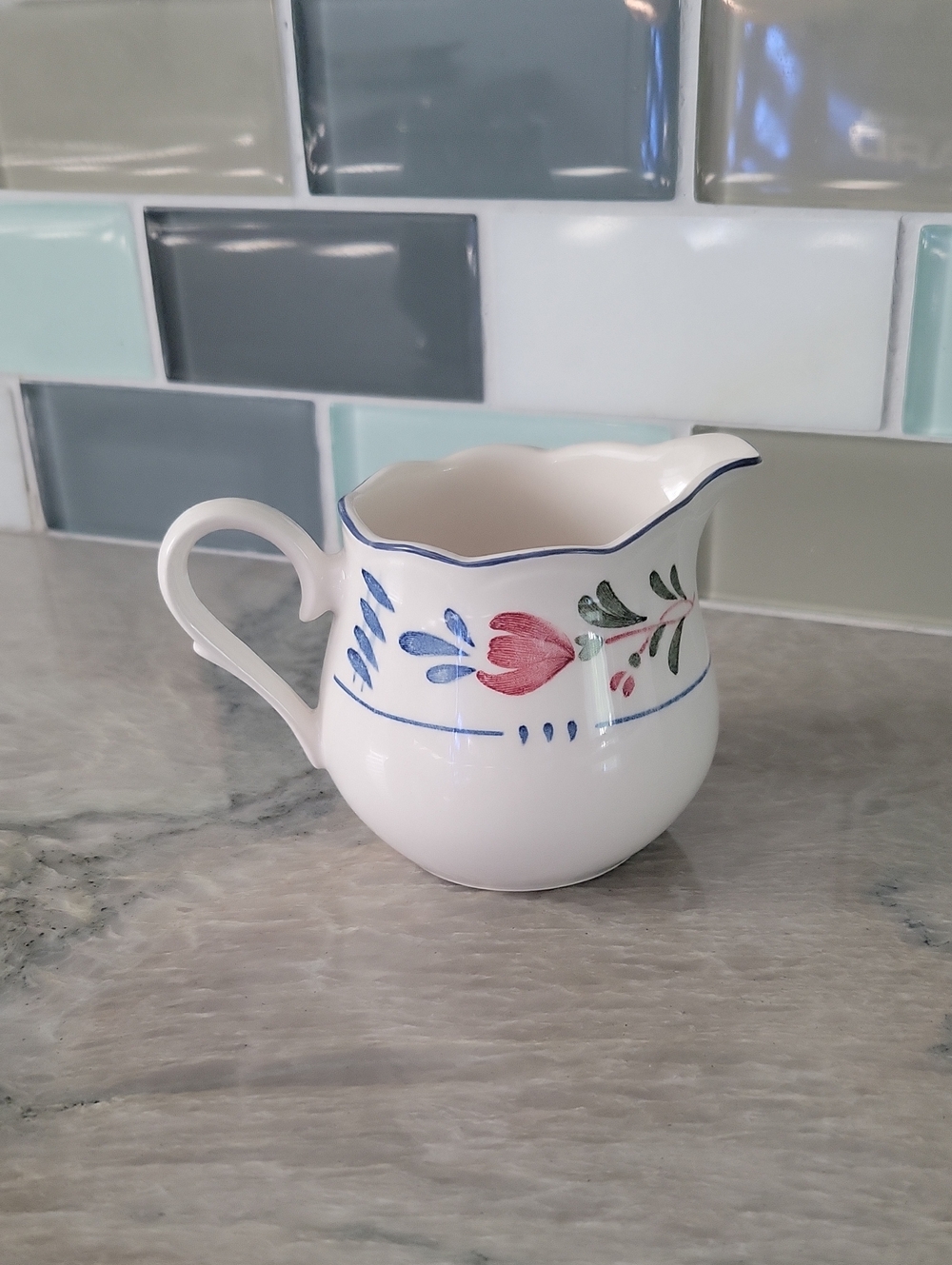 Nikko Ceramics White Creamer with Blue Trim and Pink Floral Pattern